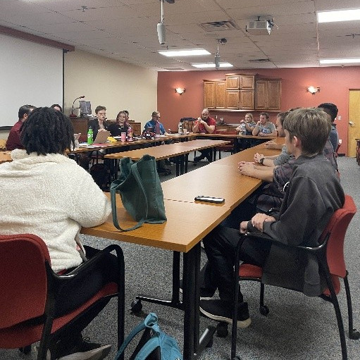 UE Local 1498 members seated around a large table.