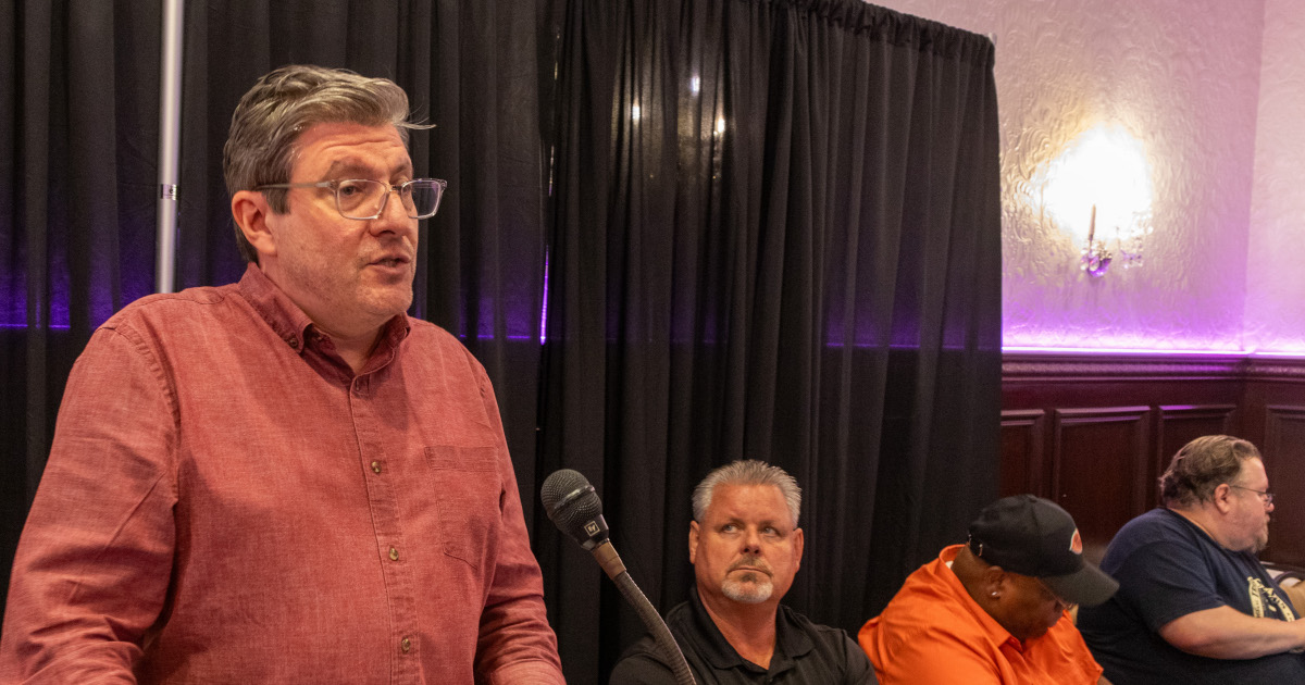 UE Director of Organization Mark Meinster speaking with Western Region officers seated to his left